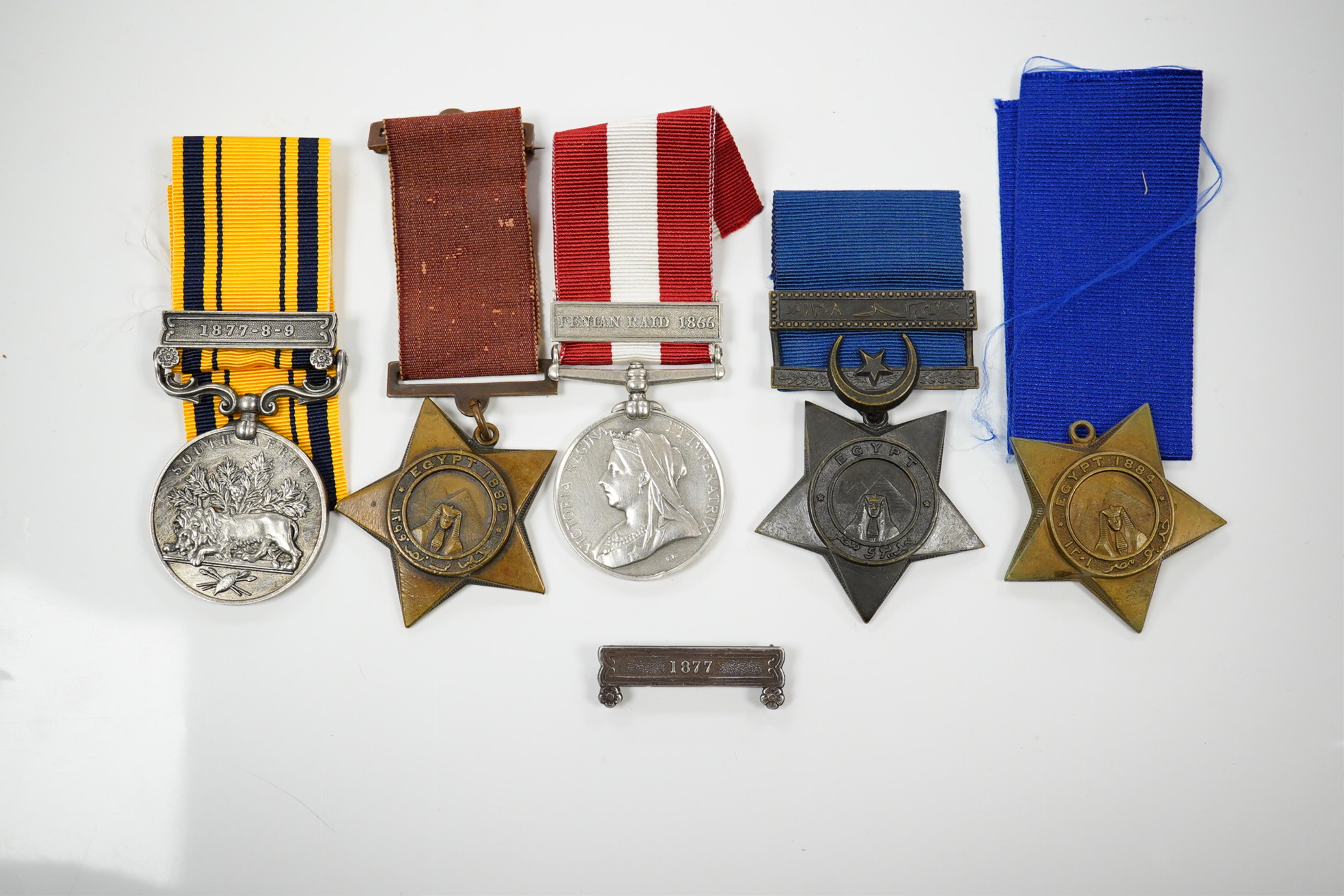 Five replica medals; Khedive's Star 1882, another undated with clasp and a third, 1884 lacking bar, Canada General Service with Fentan Raid 1866 clasp and South Africa medal with 1877-8-9 clasp and a spare 1877 clasp.